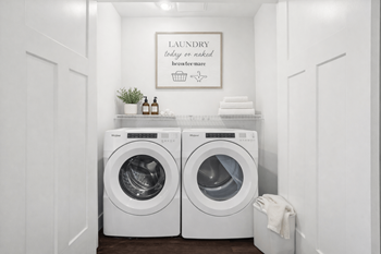 Laundry room with front loading washer and dryer